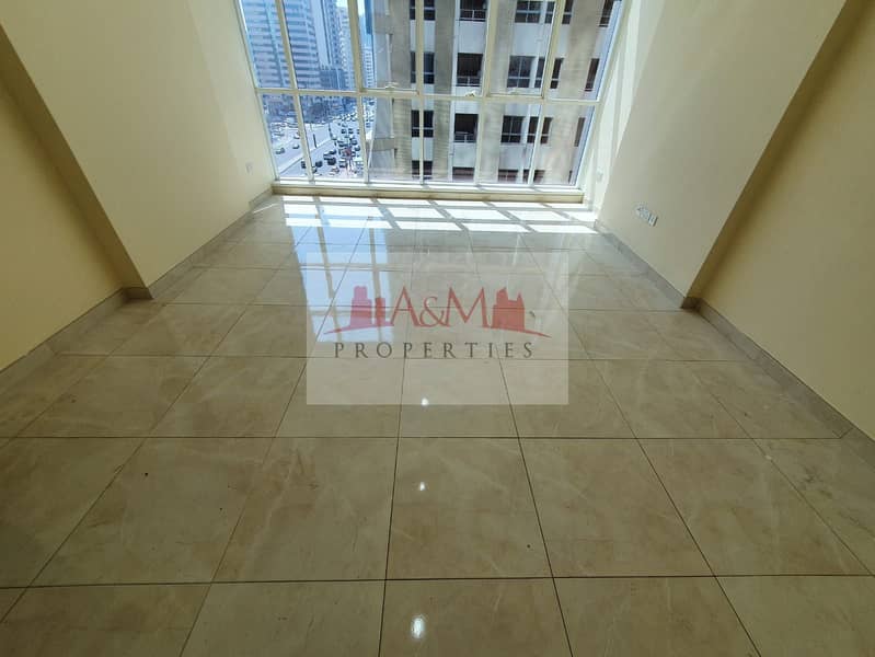 Hot Offer | Three Bedroom Apartment with Maids room & Parking in Hamdan Street for AED 100,000 Only. !