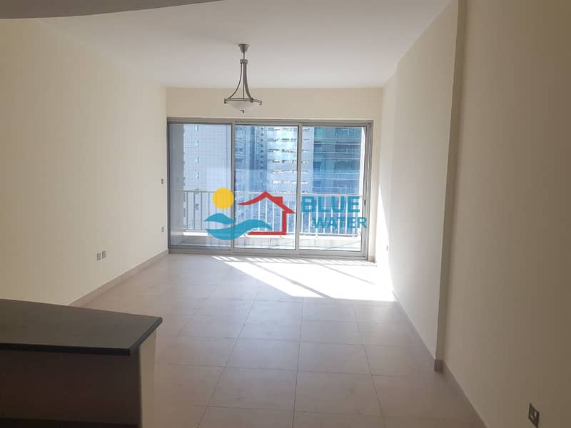Stunning 1 Br with Balcony, swimming pool, Gym, Parking