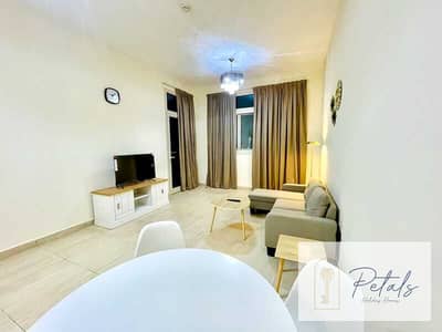 1 Bedroom Flat for Rent in Al Furjan, Dubai - 🌟 Embrace Floral Tranquility: Short-Term Bliss at Azizi Daisy, Al Furjan! 🌼✨