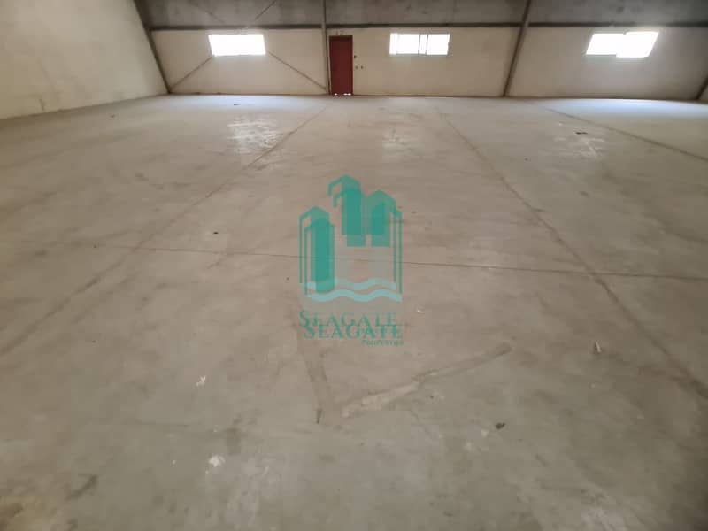 15000 square feet land and 10000  square feet warehouse in Quoz industrial 2