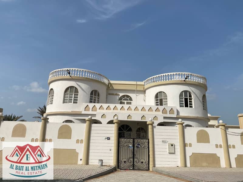 Two-storey villa, seven rooms, two councils, and two halls in Muwafaja