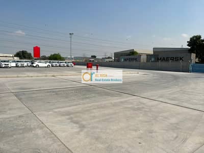 Industrial Land for Rent in Al Quoz, Dubai - Interlock Concrete Land for Rent | Prime Location in Al Quoz.