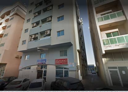 Shop for Rent in Ajman Industrial, Ajman - For rent a shop with a mezzanine directly on the street, with the availability of pools, suitable for any commercial activity, annual rent 19000