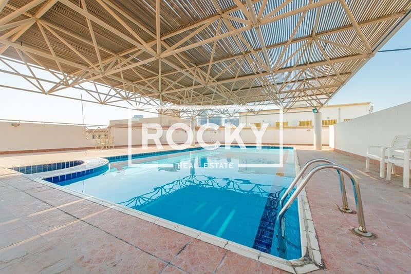 Look! Stunning Studio with Balcony | Pool & Gym | Al Karama