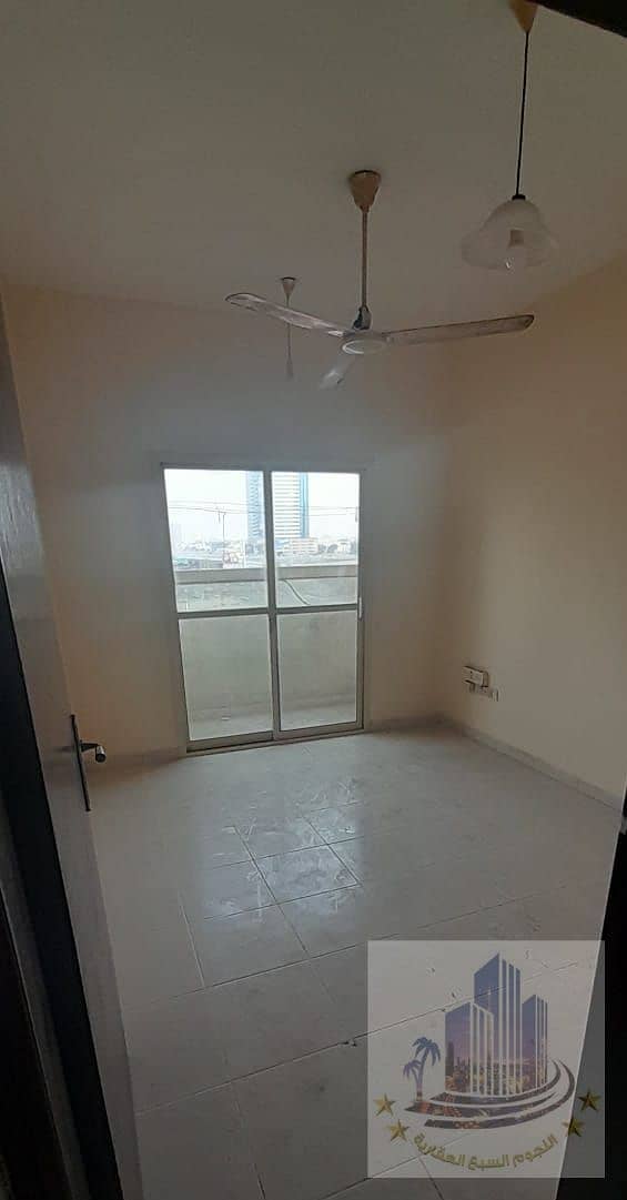 Two rooms and an annual hall, 2 bathrooms, with a balcony, a very excellent area, a separate hall in the Rashidiya area 1, Sheikh Khalifa main street