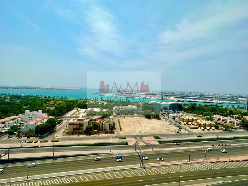 One Month Free | Full Sea View | Elite Class Four Bedroom Apartment with Balcony & all Facilities in Al Mina Street for AED 130,000 Only. !