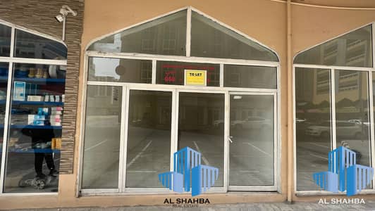 Shop for Rent in Abu Shagara, Sharjah - HOT DEAL ∫ Spacious Shop ∫ Close to Nesto Hyper Market