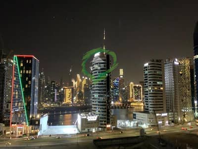 Studio for Sale in Business Bay, Dubai - Iconic Burj and Canal View Upgraded Rented Studio