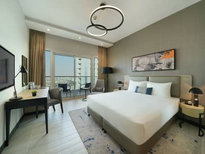 Studio for Rent in DAMAC Hills 2 (Akoya by DAMAC), Dubai - Damac Hills 2 Hotel - Edge by Rotana, Monthly rates starting from AED 3,499 with free shuttle service to Business Bay Metro Station