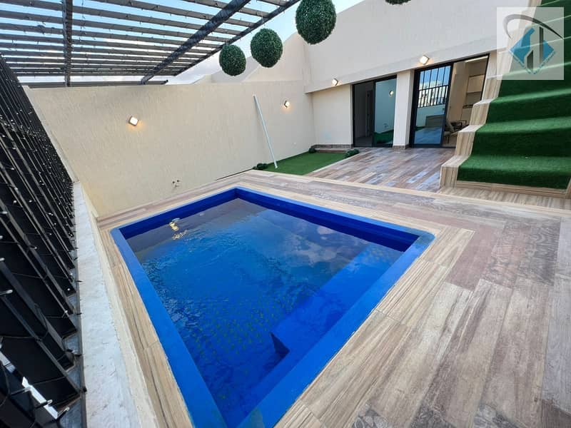 For sale, a villa with a swimming pool in the Emirate of Ajman, Al Zahya, a new three-storey villa, the first inhabitant, without down payment, in ins