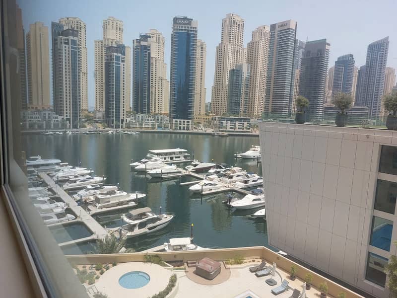 Spacious Living Room | Full Marina & Pool View Spacious Living Room | Full Marina & Pool View