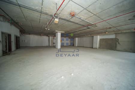 Showroom for Rent in Al Qusais, Dubai - Shell & Core Showroom Spaces in Al Qusais | Call Now