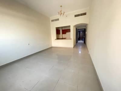 Studio for Rent in International City, Dubai - CHEAPEST STUDIO APARTMENT FOR RENT IN SWIMMINGPOOL KIDS AREA AND PARKING