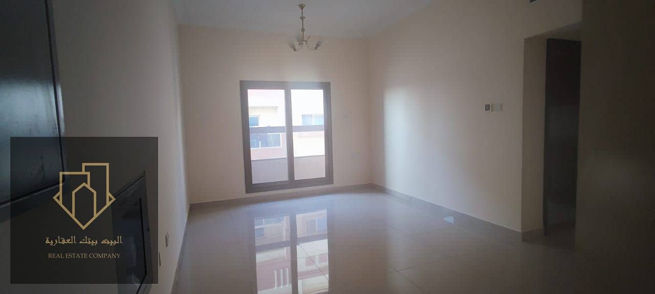 For annual rent in Ajman, a room and hall, another inhabitant, balcony, 2 bathrooms, there are 2 studios, one balcony and another without a large area