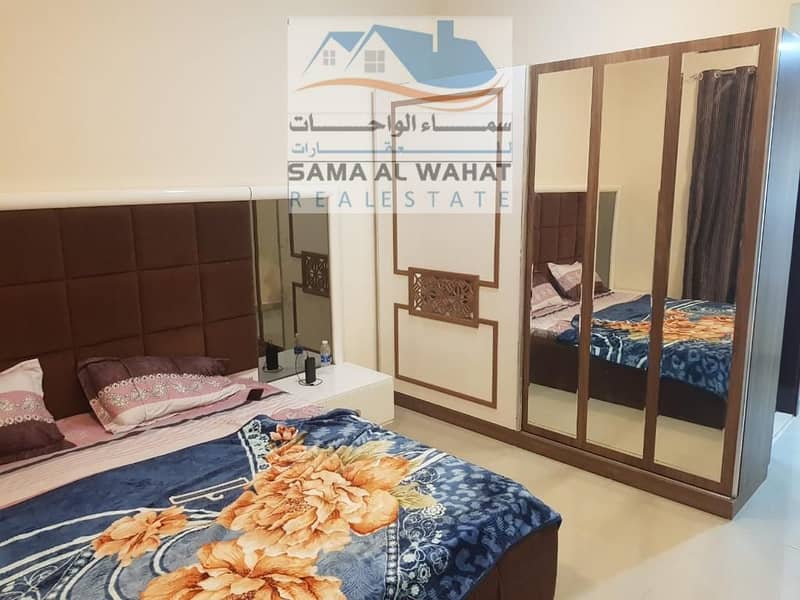 Peace be upon you, two rooms and a hall, two bathrooms, a balcony, a large area, Sharjah Al Taawun furnished, hotel furniture, Sharjah Al Taawun, a vi