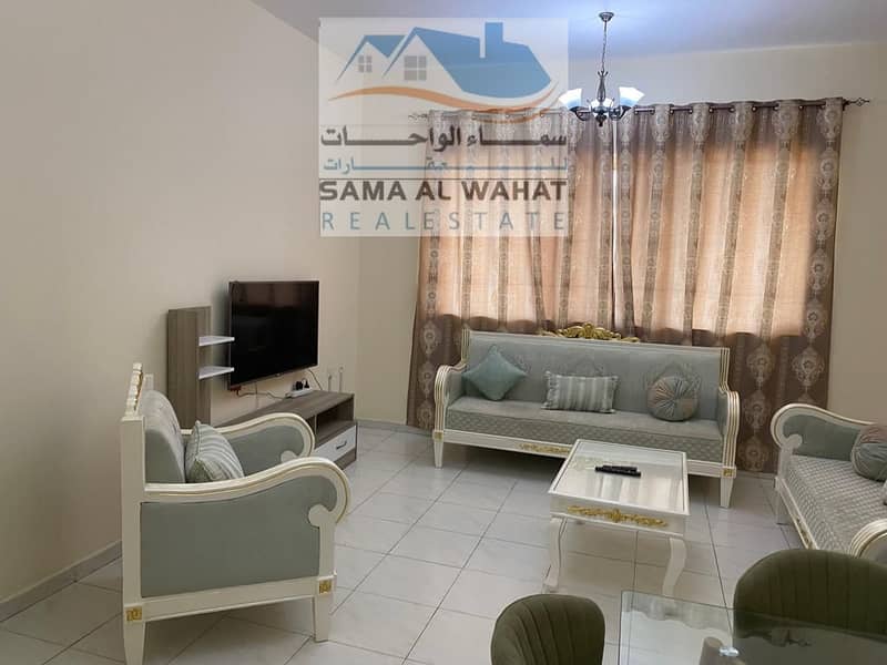 Sharjah, Al-Taawun, opposite Oriana Hospital, one room and a hall, the price is 3900, including I