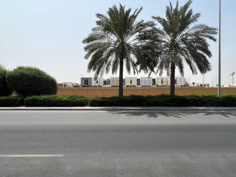 Commercial land in Al-Zawraa on the main street Commercial land in Al-Zawraa on the main street