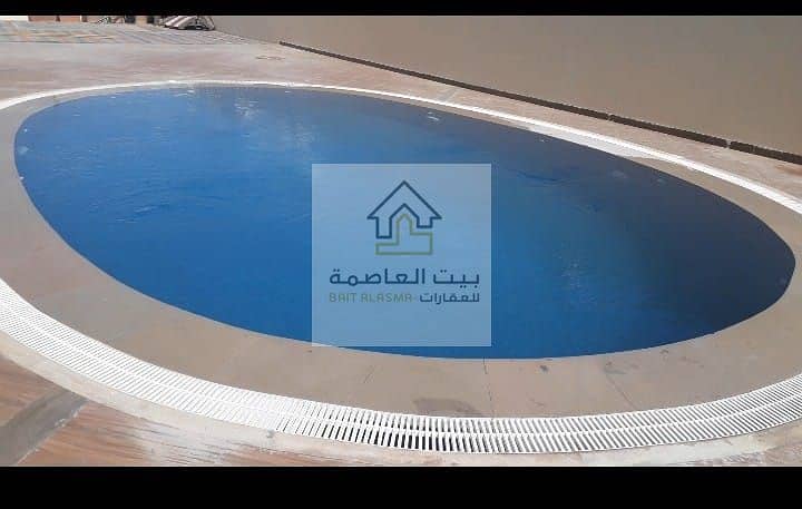 A NEW BRAND AND STAND ALONE  VILLA IN THE FORM OF A ROYAL PALACE  WITH ALL FEATURES OF LUXURY FOR SALE LOCATED IN SHAKHBOUT CITY IN ABU DHABI EMIRATE
