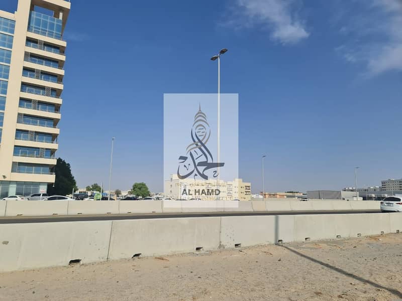 For sale, direct from the owner, residential commercial land, building permit, G+ 10 floors, land in the most important street of umm Al Quwain,