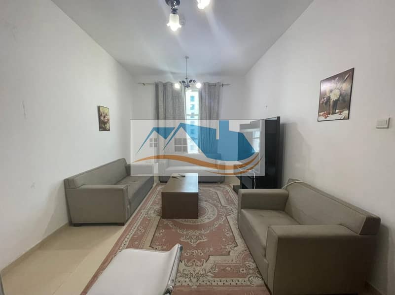 For rent in Ajman, a room and a furnished hall City Tower on Sheikh Khalifa Main Street, including electricity, water, sewage, internet and parking fo