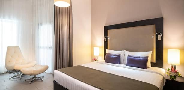 شقة فندقية 1 غرفة نوم للايجار في برشا هايتس (تيكوم)، دبي - شقة فندقية في برشا هايتس (تيكوم) 1 غرفة 7499 درهم - 7864321