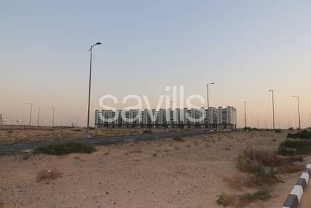 Mixed Use Land for Sale in Tilal City, Sharjah - G+4 | Terraced Apartments with Retail | Opposite Victoria International