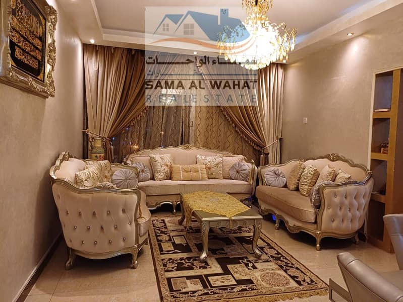 Al Majaz 2, Jamal Abdel Nasser Street, two rooms, a hall, two receptions, a large area, furnished, new furniture, super, price 5700, includi