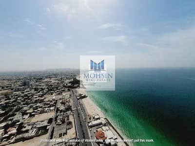 2 Bedroom Flat for Sale in Corniche Ajman, Ajman - Sea view 2BHK for Sale in Corniche Towers