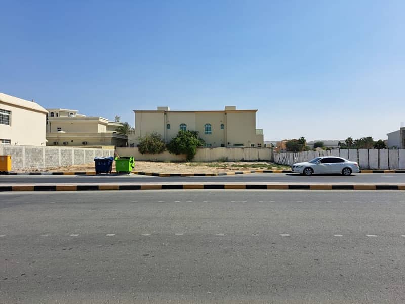 For sale two plots of land in Al Quoz   in front of the garden main Street