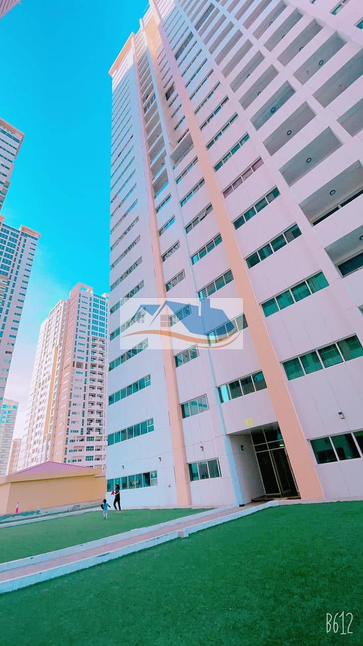 For rent in Ajman, two rooms and a hall, large areas, and a furnished room and hall are available, including electricity, water, sewage, internet, and