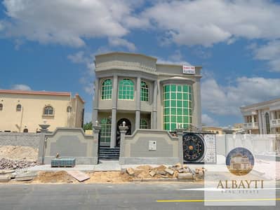 Villa for Sale in Al Rawda, Ajman - Discover the perfect blend of convenience and luxury with our brand new commercial corner villa for sale. This stunning property boasts 5 master bedro