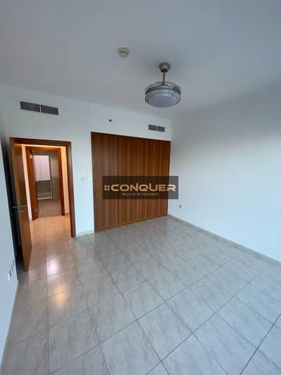 فلیٹ 2 غرفة نوم للبيع في مجمع دبي ريزيدنس، دبي - شقة في برج سكاي كورتس A،أبراج سكاي كورتس،مجمع دبي ريزيدنس 2 غرف 900000 درهم - 7932381
