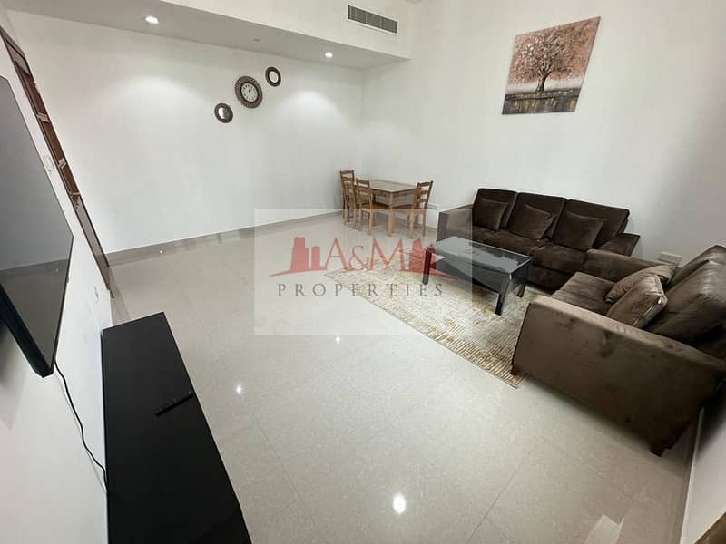 Fully Furnished | Brand New One Bedroom Apartment with Excellent Finishing in TCA for AED 6,500 Monthly. !