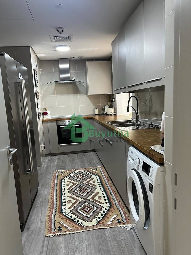 Semi Furnished 2BR Apt | Water View | Prime Location