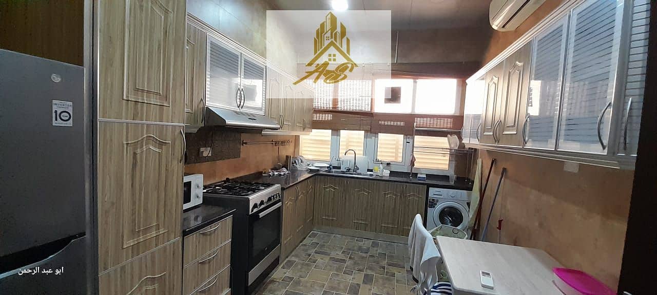 For rent in Al Rahba, close to Al Rahba Post Office, a two-room apartment and a lounge on the ground floor. The apartment is fully furnished, there ar