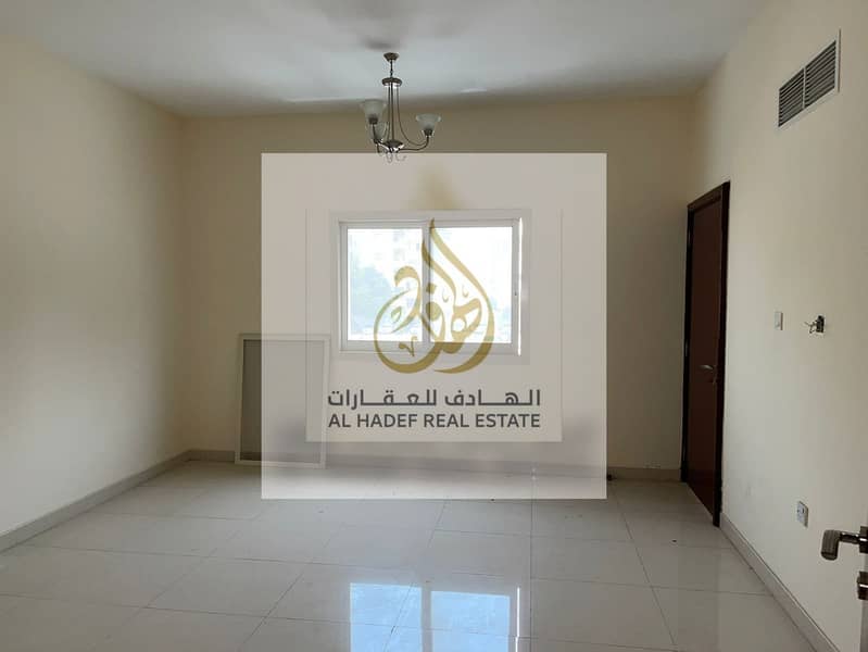 For rent in Ajman for lovers of large spaces, a room and a hall with 2 bathrooms, a very large area in Al Nuaimiya, opposite the UAE markets