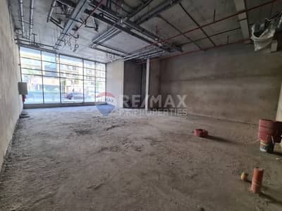 Shop for Sale in Arjan, Dubai - Rented Fitted Shop | Facing Road | Prime Location