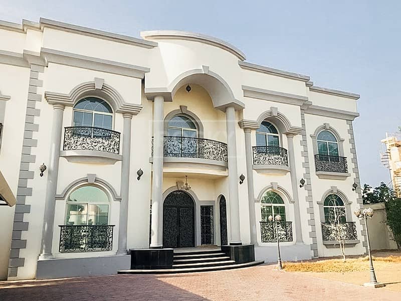 8-Bed Villa with 5 Covered Parking in Umm Al Sheif 8-Bed Villa with 5 Covered Parking in Umm Al Sheif