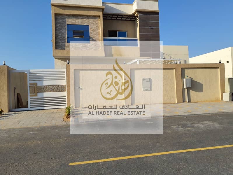 For rent, a villa in Ajman, a first model, living in Al Zahia, a large area, 4 master rooms, with an external yard, and a very easy exit to Sharjah an
