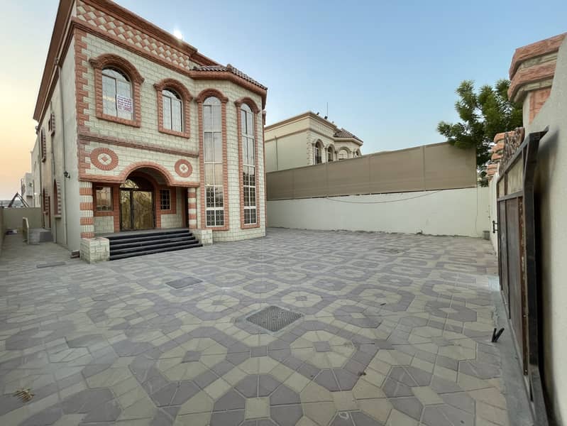A villa in Ajman, Al Mowaihat 2 area, on an asphalt street, and a very large setback space in front of the house for parking cars, at a fantastic price, less than the market price, due to the necessity of selling. The villa area is 5000 square feet