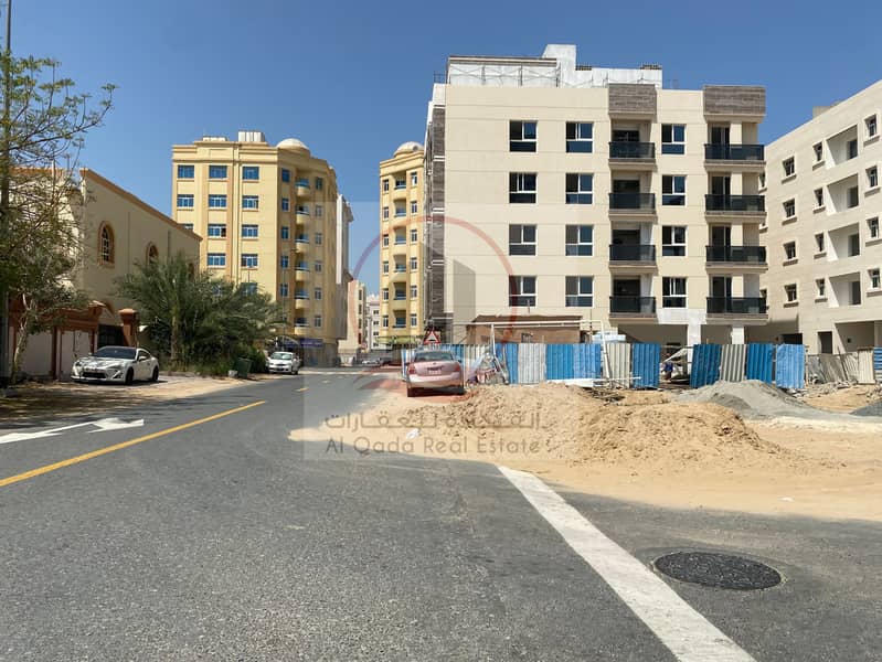 Residential commercial land at hamadia Ajman, Behind traffic, Permit G+6 + shops, at the city center