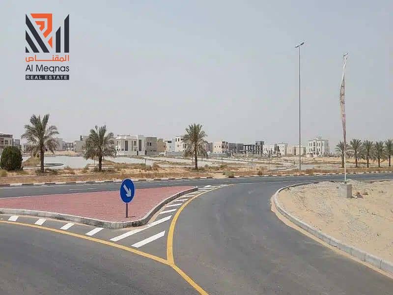 Residential investment lands for sale in installments in Al Bahia  Ajman integrated services