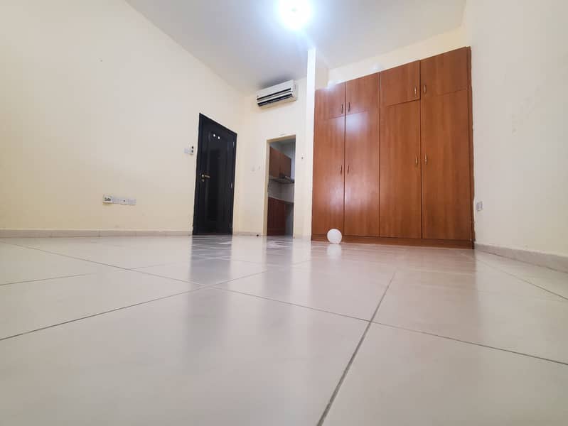 OUT CLASS  BIG STUDIO WITH WARDROBE AND SAPRATE KITCHEN  HUGE ROOM SIZE GOOD CONDITION EXCELLENT BATHROOM PRIME LOCATION IN MBZ