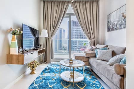 شقة 1 غرفة نوم للايجار في الخليج التجاري، دبي - Living room area