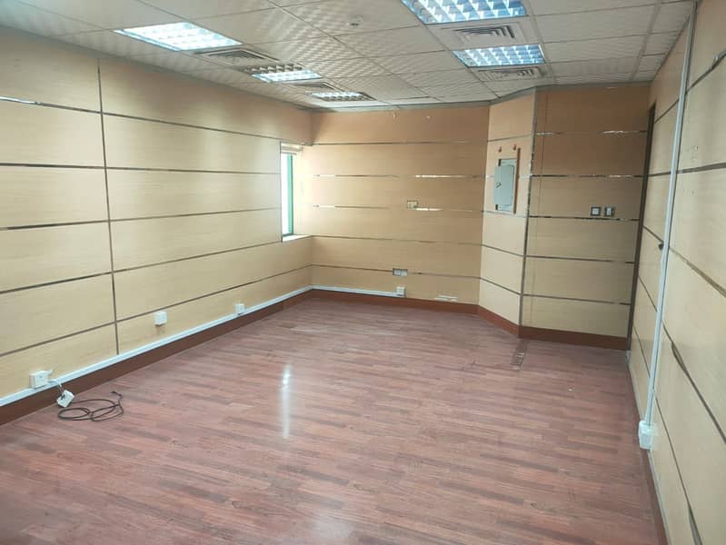 "Modern and Spacious Office Space - Chiller-Free and Conveniently Located in Abu Dhabi!"