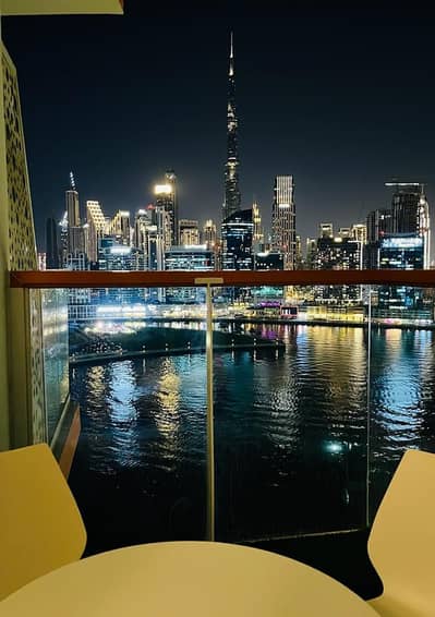 Studio for Rent in Business Bay, Dubai - It\\\'s a great view at night from our balcony. Even from our Bed