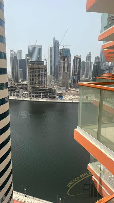 2 Bedroom Flat for Sale in Business Bay, Dubai - Ready to move in or invest with a return of 20% view of the canal and Main Street