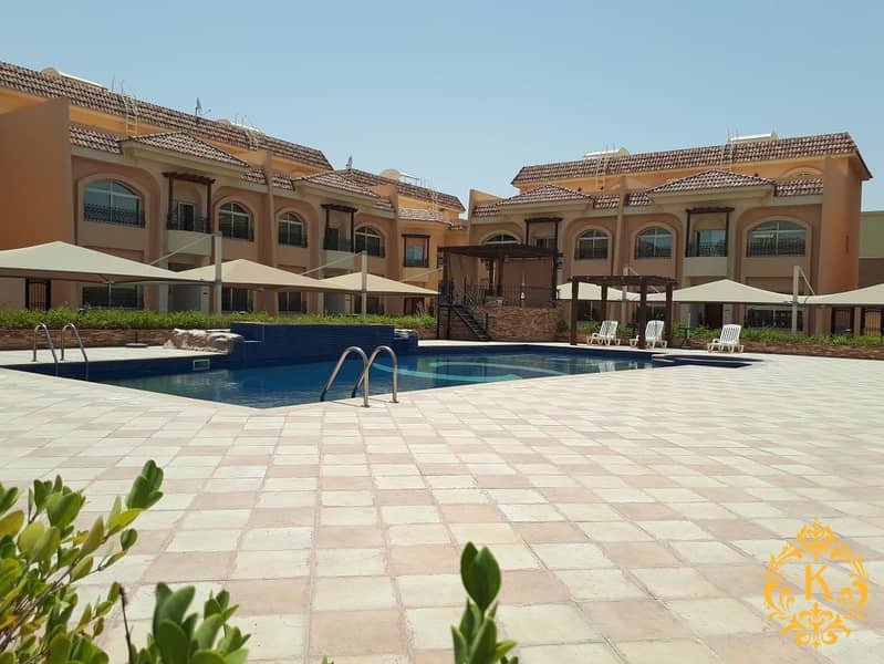 Compound Villa Six Bedrooms Hall,Dining Space,Nice Kitchen With Back Yard,Washing Room,Maid Room,Nice Terrace,Pool,Gym,Two Covered Car Parking At Al R