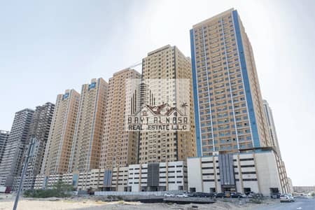 2 Bedroom Apartment for Sale in Emirates City, Ajman - Spacious two bedroom hall apartment for sale in Paradise lake tower B9 Emirates City