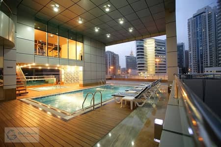 شقة فندقية  للايجار في برشا هايتس (تيكوم)، دبي - SWIMMING POOL